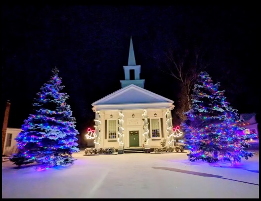 The Hartland Music Hall lit up at night